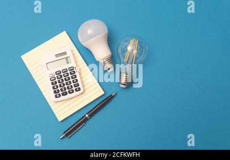 Light bulbs, energy efficiency concept on blue background Stock Photo