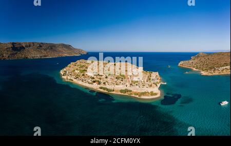 Aerial drone view of an old Venetian fortress island and former Leper colony (Spinalonga, Crete, Greece) Stock Photo