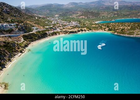Aerial view of Voulisma beach and the clear Aegean Sea (Crete, Greece)