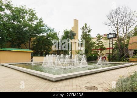 Yevpatoria, Crimea, Russia-September 7, 2019: Monument to Russian writer Maxim Gorky and fountain in the Park on the embankment Stock Photo