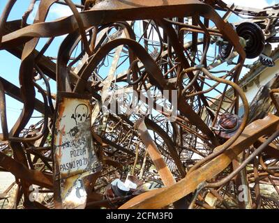 Rusty metal on the abandoned salt factory. Postacalyptic view. Garbage.Trash. Ugly beauty.Impressive sight. Postmodern. Steam punk culture. Stock Photo