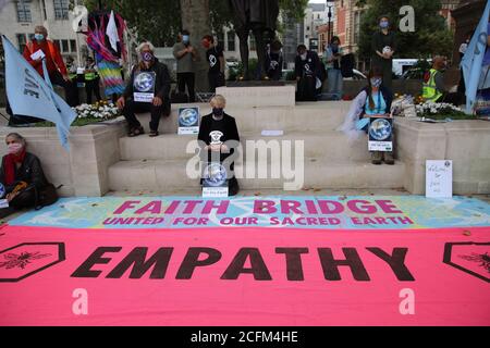 London, UK. 06th Sep, 2020. Extinction Rebellion protestors march from Parliament Square to Tate Modern to highlight the dangers to marine life from global warming and climate change, 6th September 2020. Christian XR members call for empathy on Parliament Square Credit: Denise Laura Baker/Alamy Live News Stock Photo