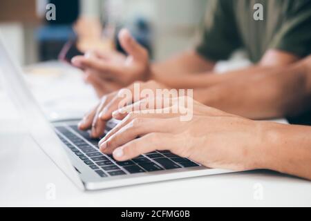 Young startup businessmen teamwork brainstorming meeting to discuss the new project investment. Stock Photo