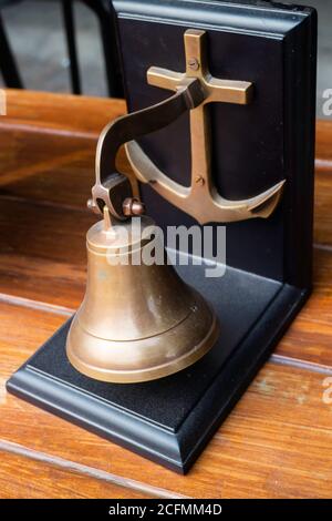 Vintage service bell on wooden table, stock photo Stock Photo