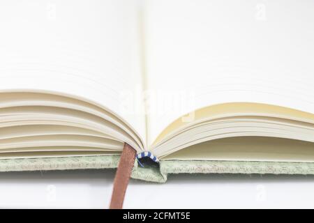 Closeup opened notebook on white background, stock photo Stock Photo