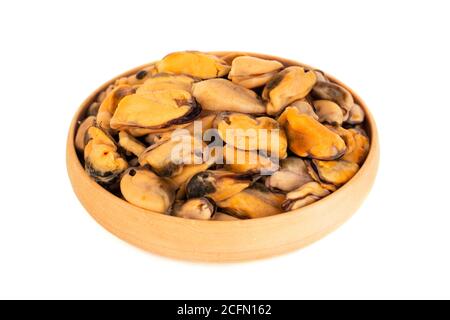 Fresh raw small mussel meat in a wooden japaneese plate studio isolated on white background Stock Photo