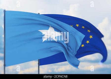 Waving European Union flag and flag of Somalia. Closeup view, 3D illustration. Stock Photo