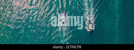 Aerial view of small boat flowing in sea, travel and vacation concept BANNER, LONG FORMAT Stock Photo