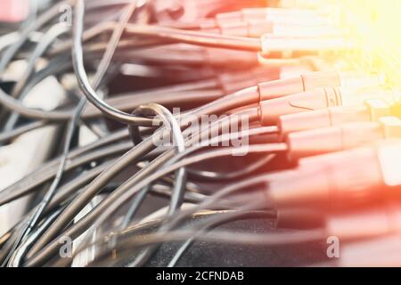 Close up audio jacks cable plugged into mixer console. XLR audio cable Stock Photo