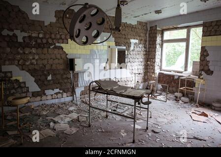 Pripyat / Ukraine - May 15, 2018: operating room in wrecked hospital in abandoned Pripyat, Ukraine Stock Photo