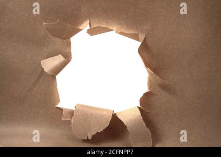 big paper hole as very easy background Stock Photo