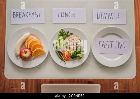 Intermittent fasting during dinner. Intermittent fasting concept, top view