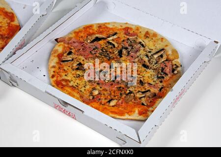 Ham and mushroom pizza, Andalucia, Spain, Europe. Stock Photo