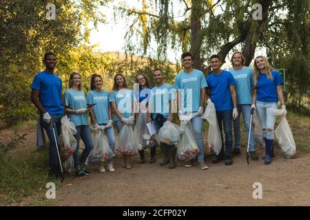 Holding bags full of rubbish Stock Photo