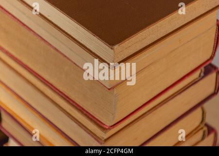 Background with piled up old books Stock Photo