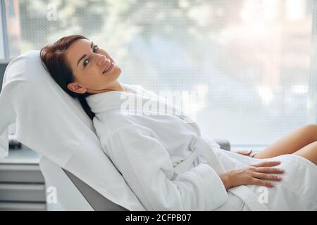 Smiling spa client posing for the camera Stock Photo