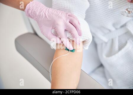 Woman undergoing a medical procedure in a beauty clinic Stock Photo