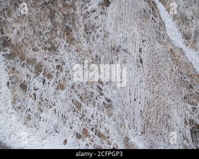 Outside salt walls of the salt mountain, Cardona, Spain. Close up view. Natural background texture. Stock Photo