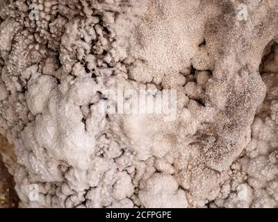 Inside salt walls of the salt mountain cavern, Cardona, Spain. Close up view. Natural background texture. Stock Photo