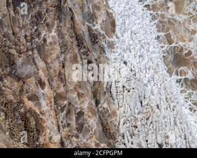 Outside salt walls of the salt mountain, Cardona, Spain. Close up view. Natural background texture. Stock Photo