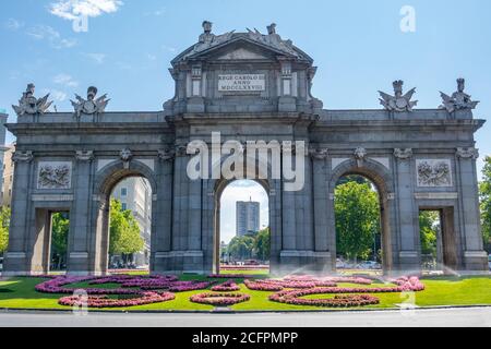 The Alcala Door (Puerta de Alcala) is a gate in the center of Madrid, Spain. It is the landmark of the city. Stock Photo