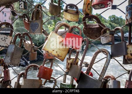 GRAZ, AUSTRIA - SEPTEMBER 04, 2020:Padlocks on bridge over river Mur in Graz, Austria Stock Photo