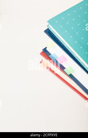 Stack of books with colored memory notes and copy space Stock Photo