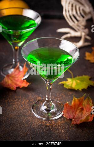 Halloweens spooky drink green martini cocktail Stock Photo