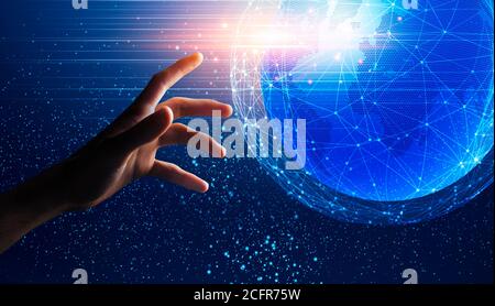 Global Connections And Network. Hand reaching world globe hologram with polygonal dots Stock Photo