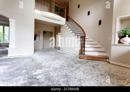 Staircase and floor being remodeled with solid red oak wood Stock Photo