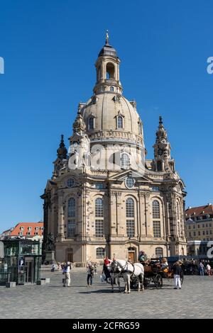 Dresden, Saxony / Germany - 3 September 2020: horse and carriage in front of the Frauenkirche Church in downtown Dresden Stock Photo