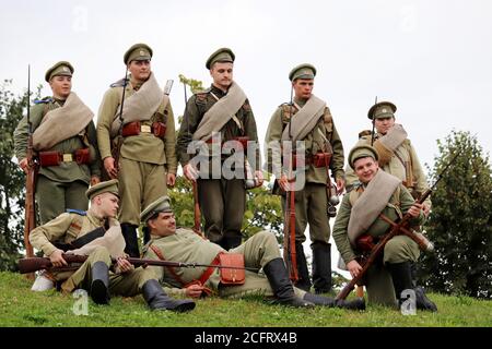 Soldiers of the Russian Empire of early 20th century with rifles during the city day of Moscow in Mitino park, reconstruction of the World war I Stock Photo