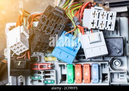 Colorful wire harness and plastic connectors for vehicles, automotive industry and manufacturing Stock Photo