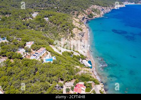 Stock picture dated July 2020 of Agua Blanca beach on the Spanish island of Ibiza by the Mediterranean Sea. It is in the municipality of Santa Eulˆria des Riu and is 6.4 miles north east of the town of Santa Eulˆria des Riu. Stock Photo