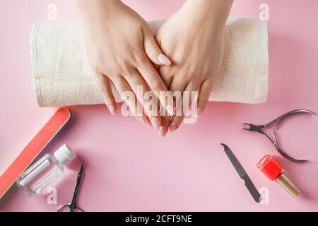 Woman hands receiving manicure and nail care procedure – Jacob Lund  Photography Store- premium stock photo