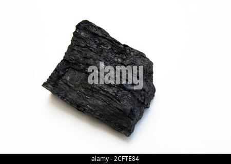 detail of bituminous coal isolated over white background Stock Photo