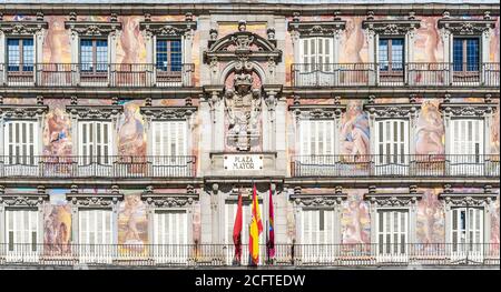 Madrid, Spain - 19 February 2020: Detail of a decorated facade and balconies at the Plaza Mayor, Madrid, Spain. Stock Photo