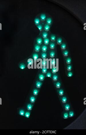 Glowing Green Walk Traffic Light Sign Stock Photo - Alamy