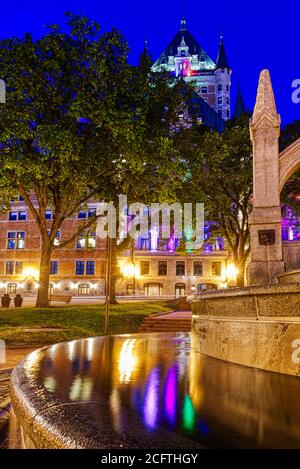 The Chateau Frontenac at night reflected in a water fountain, Quebec City, Canada Stock Photo