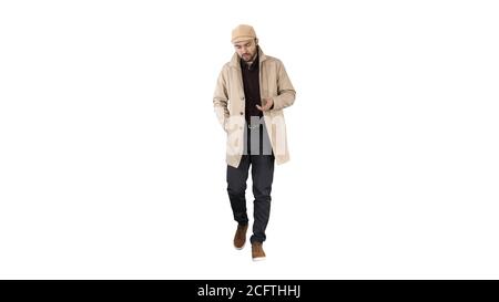 Thoughtful look Man walking and talking to himself on white background. Stock Photo