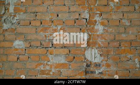 Brick ready to build house wall in a construction site. Brick wall, masonry, ready for repair. Stock Photo