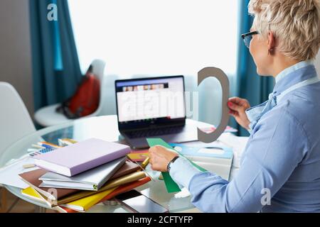 busy caucasian teacher tutor learn teach in online chat, distance webinar online teaching concept Stock Photo