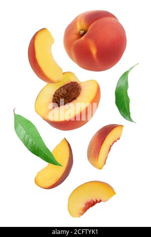 falling ripe peach slices isolated on white background Stock Photo