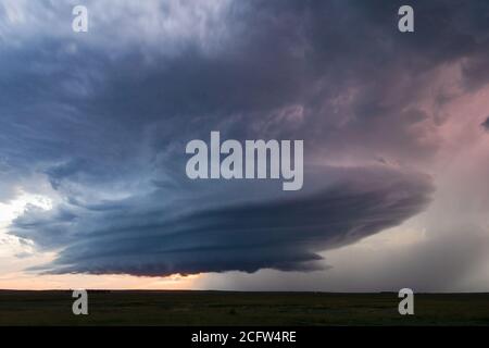 Great plains landscape with a striated supercell thunderstorm cloud near Martin, South Dakota Stock Photo