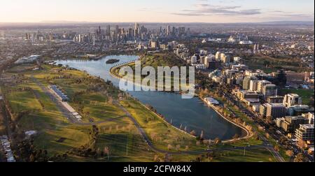 Melbourne Australia. Aerial view of Albert Park Lake and Grand Prix circuit with Melbourne skyline in background.