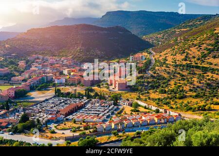 Aerial view of the beautiful village of Bosa with colored houses and a medieval castle. Bosa is located in the north-wesh of Sardinia, Italy. Aerial v Stock Photo