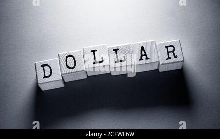 Dollar Word Written on Wooden Cubes Stock Photo