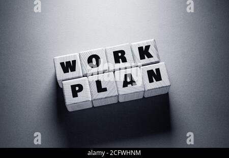 Work Plan Word Written on Wooden Cubes Stock Photo