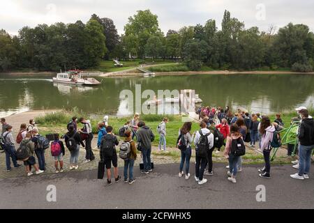 Remagen, Germany. 27th Aug, 2020. Students from the Gymnasium Nonnenwerth, a private school located on an island in the Rhine, are waiting for the ferry. Eight percent of the approximately 522,000 students in Rhineland-Palatinate attend private schools. (to dpa 'Private schools in trend - country without school fees') Credit: Thomas Frey/dpa/Alamy Live News Stock Photo