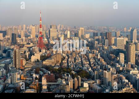 View of Tokyo Tower and surrounding areas at sunset Stock Photo